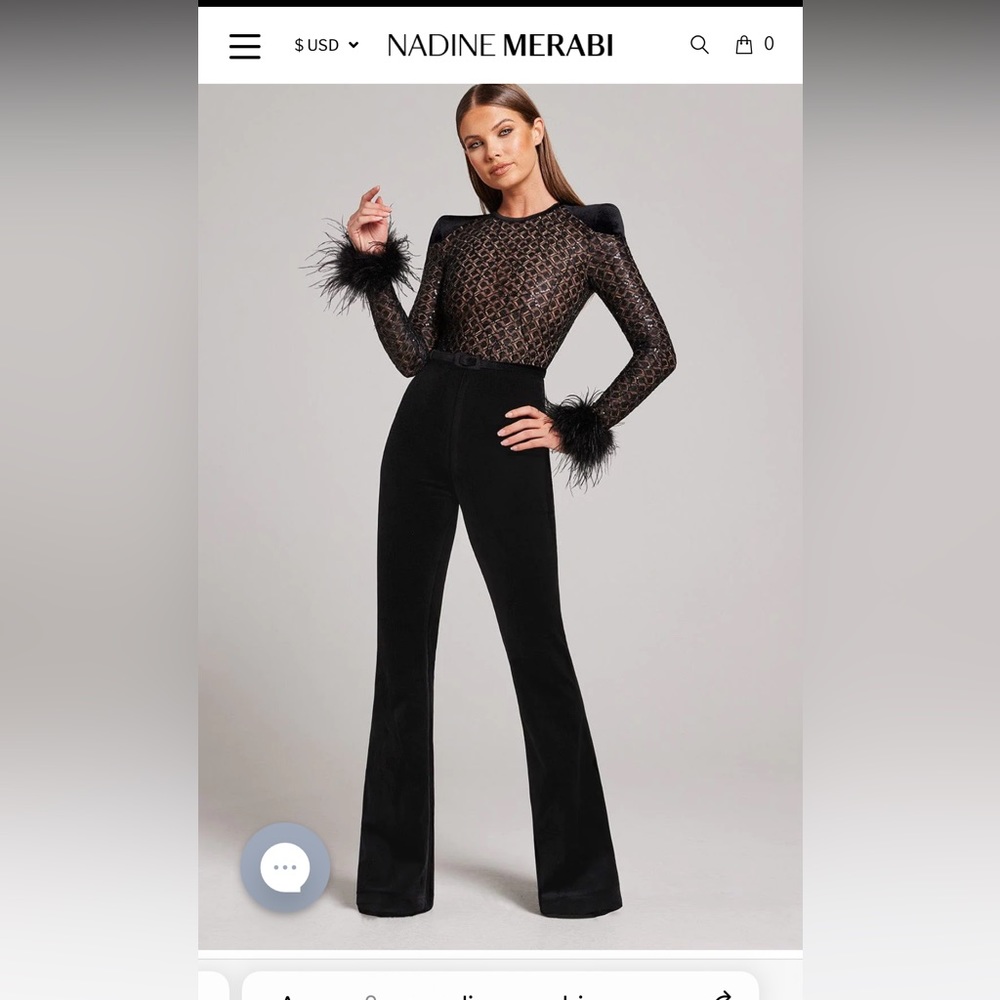Nadine Merabi black jumpsuit size small. Worn once, great condition.Missing belt